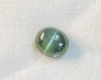 2.50 Carat Greenish Tourmaline Cat's Eye Cabochon (8.50x7.50mm)