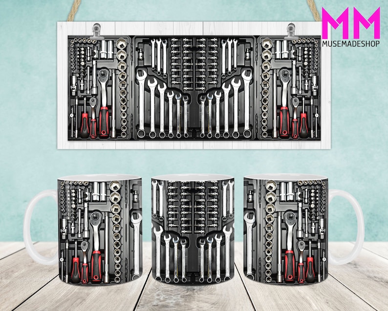 May include: Two white ceramic mugs with a black and white image of a tool box filled with wrenches, screwdrivers, and sockets. The image is repeated on both mugs.
