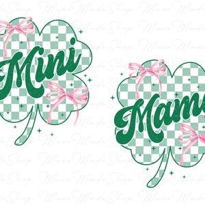 May include: Two green four-leaf clover designs with pink bows. The top clover has the word "Mini" in a green script font. The bottom clover has the word "Mama" in a green script font.