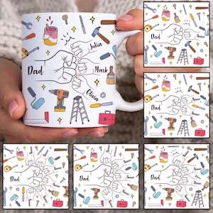 May include: White ceramic mug with a design featuring tools, a fist bump graphic, and the word "Dad." The names "Julia," "Mark," and "Olivia" are also included. The mug is decorated with various tools and stars.