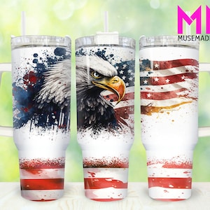 May include: Three stainless steel tumblers with a white background and a design of an American bald eagle with red, white, and blue watercolor splatters and an American flag. The tumblers have a white handle and a clear lid.