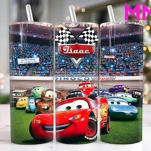 May include: A red, white and black personalised tumbler with a chequered flag design and the name "Isaac" on it. The tumbler features a scene from the Cars film with Lightning McQueen, Mater and other characters. The tumbler is ideal for any fan of the Cars films.