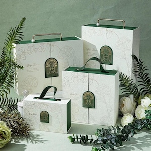 May include: A set of three ceramic mugs with a speckled, matte finish. The mugs are in shades of cream, light gray, and dark gray. Each mug has a simple, minimalist design, perfect for coffee or tea.