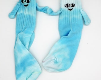 Not so tie-dyed hand holding socks