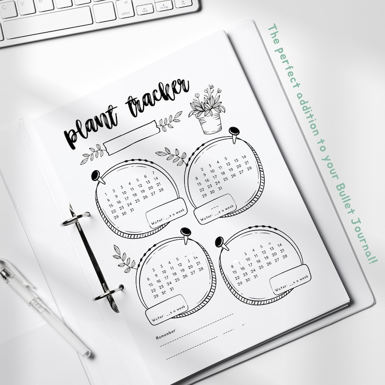 May include: A black and white printable plant tracker with four circular calendars for tracking watering schedules. The tracker includes the text "plant tracker" and "The perfect addition to your Bullet Journal!"