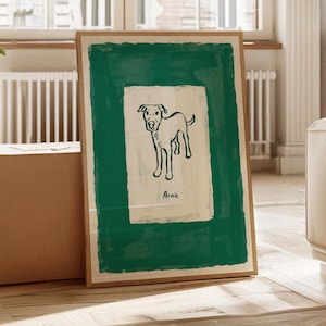 Puede incluir: Una ilustración enmarcada en verde y blanco de un perro llamado Arnie. El perro está de pie sobre un fondo blanco con un borde verde.