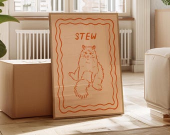 May include: A framed print featuring a cat illustration with the word "STEW" at the top. The cat is drawn in an orange outline, sitting with its tail curled. The frame has a wavy orange border.