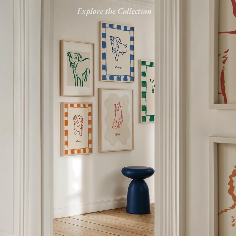 May include: A selection of framed dog art prints in different sizes and colours, including green, blue, and orange. The prints feature simple line drawings of dogs. The text "Explore the Collection" is at the top.