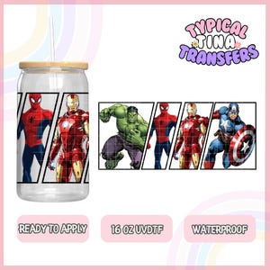 May include: A 16 ounce clear tumbler with a wood lid and a straw. The tumbler has a design of four superheroes: Spiderman, Iron Man, Hulk, and Captain America. The text "READY TO APPLY", "16 OZ UVDTF", and "WATERPROOF" is printed below the tumbler.