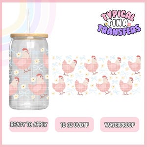 May include: A clear glass can-shaped tumbler with a bamboo lid and straw. The tumbler features a repeating pattern of pink chickens, white flowers, and blue bows. The text "Typical Tina Transfers" is in the upper right corner.