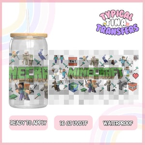 May include: A 16 ounce clear tumbler with a wood lid and a straw. The tumbler has a design of Minecraft characters and the word "Minecraft" on it. The tumbler is ready to apply and waterproof.