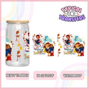 May include: A 16 ounce clear tumbler with a bamboo lid and straw. The tumbler is decorated with a sublimation design featuring Belle and the Beast from the Disney movie Beauty and the Beast. The design includes a watercolor background with fall leaves and the text "Beauty and the Beast".