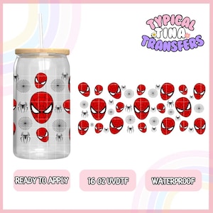 May include: A clear glass can-shaped tumbler with a bamboo lid and straw. The tumbler features a repeating pattern of red Spider-Man faces, spider webs, and spiders. The text "READY TO APPLY", "16 OZ UVDTF", and "WATERPROOF" is also visible.