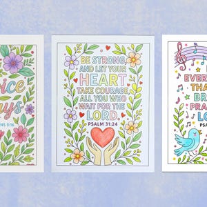 May include: Three colorful art prints with inspirational quotes and floral designs. The prints feature the phrases "Rejoice always", "Be strong and let your heart take courage", and "Let everything that has breath praise the Lord".