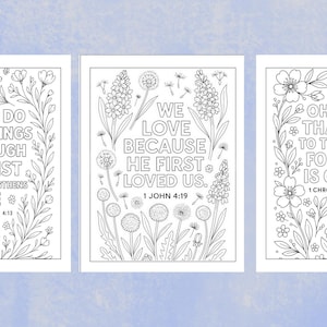 May include: Three black and white coloring pages with floral borders and inspirational quotes. The quotes include "I can do all things through Christ", "We love because he first loved us", and "Oh give thanks to the Lord, for he is good!"
