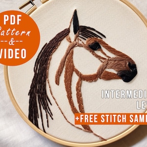 May include: Embroidered horse head design in a wooden embroidery hoop. The design is brown, black, and white. The text "PDF Pattern & VIDEO" is in a circle in the upper left corner. The text "INTERMEDIATE LEVEL" is in the lower right corner. The text "+ FREE STITCH SAMPLER" is in the lower right corner.