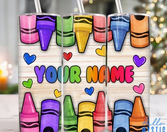 May include: A set of three 20 oz stainless steel tumblers with a white background and colorful crayon designs. The tumblers have a personalized message that says "YOUR NAME".
