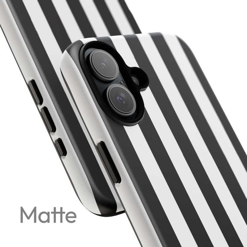 May include: Matte phone case with a black and white striped pattern. The case has a matte finish and features a camera cutout. The word "Matte" is printed on the bottom left corner.