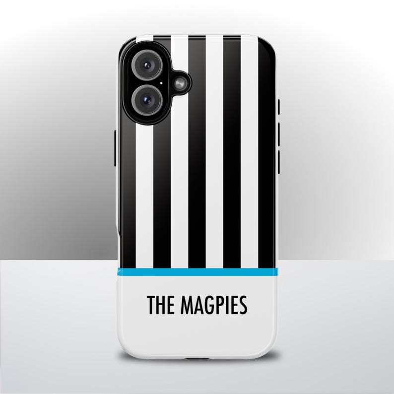 Phone case inspired by Newcastle United, featuring bold black and white vertical stripes with a thin blue accent line and the text “THE MAGPIES” at the bottom. Perfect for Toon Army supporters, this sleek football-themed phone cover is available for iPhone and Samsung Galaxy models in Tough, MagSafe, and Slim styles, offering both stylish protection and team pride.