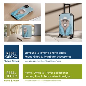 May include: A light blue phone case, mug, and suitcase featuring a lion wearing a cowboy hat and a blue fur coat. The image also includes the text "REBEL GECKO Phone Cases" and "Home & Away".