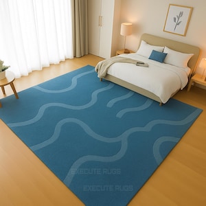 Hand-Tufted Teal Wool Rug: Embossed Wavy Line Design