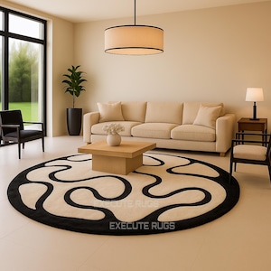 Handmade Wool Round Rug: Cream & Black Abstract Design