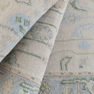 Hand Knotted Wool Oushak Rug: Cream Turkish Area Rug