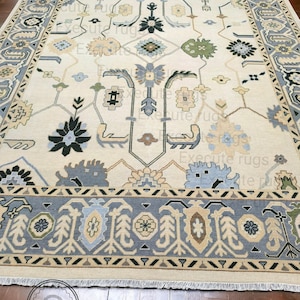 Hand Knotted Wool Oushak Rug: Light Beige Turkish Area Rug