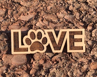 Love wooden sign with paw as decoration. Dog love wooden sign 15 cm long 5 cm high