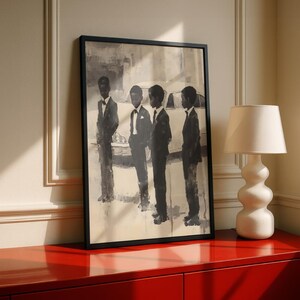 May include: A framed wall art print featuring a monochromatic painting of four individuals standing in a line, each wearing a dark suit and bow tie. The figures are positioned in front of a vintage car, rendered in shades of black, white, and cream.