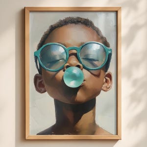 May include: An oil painting in a wooden frame depicting a person with short dark hair wearing round teal glasses and blowing a large, round, light blue bubblegum bubble. The artwork features visible brushstrokes and a neutral background.