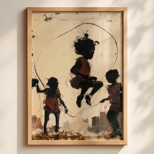 May include: A framed wall art print featuring a black and dark orange silhouette illustration of three figures jumping rope. The figures are depicted in a dynamic motion against a light beige background with textured, abstract ink-like brush strokes.