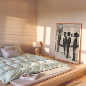 May include: A framed black and white art print depicting four figures in suits standing in front of a car. The rectangular artwork is displayed in a light-colored wooden frame, showcasing a monochromatic scene with high-contrast brushwork details.