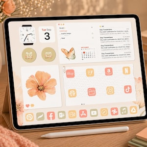 May include: A tablet displaying a digital interface with a soft peach and cream colour palette. The screen features widgets for a clock, calendar, to-do list, and email, alongside app icons for Etsy, Amazon, Netflix, and others, all styled with floral accents.