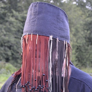 A simple shamanic mask with a fringe for the ritual. TO ORDER!