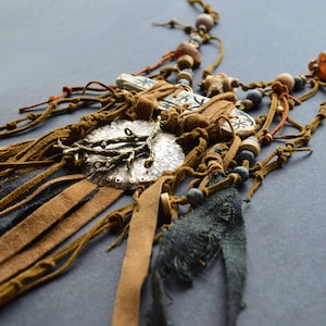 Handmade protection jewelry with the strongest shamanistic amulet - mirror Toli. Shaman statement necklace.