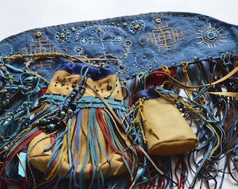 Small shamanistic set: shaman pagan mask with embroidered and medicine bags. Shamanic tools for ceremony.