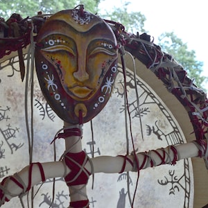 Shaman drum with Saami motives. Hand painted tambourine, museum replica of a real shamanic drum