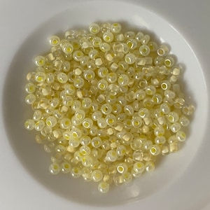 Cousin pearls and chick company. Small French glass beads. About 500 per bag.