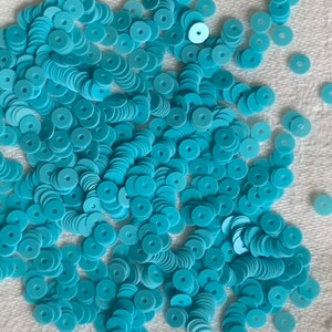 French turquoise porcelain sequins 4mm, shiny opaque porcelain appearance.