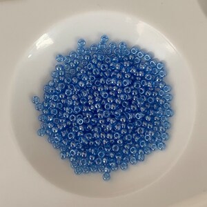 Cousin beads and little blue company. Small French glass beads. About 500 per bag.