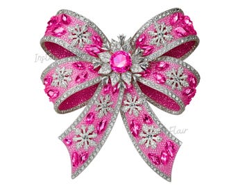 May include: A large, ornate pink bow brooch with silver-colored trim and accents. The bow is covered in sparkling pink and clear crystals, with a large pink crystal in the center. The bow's design includes snowflake and teardrop-shaped crystal embellishments.