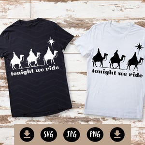 May include: Two t-shirts, one black and one white, featuring a graphic of three camels and riders under a star. The text "tonight we ride" is below the image. The black shirt has a chevron pattern.