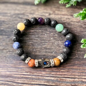 7 Chakra Bracelet Lava Stone Bracelet with Hamsa Hand Charm, Unique Design, Natural Crystal Beads, Handmade Healing and Protection Bracelet
