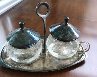 Made in Mexico silver plated cream and sugar set with a silver plated caddy 70’s cream and sugar set