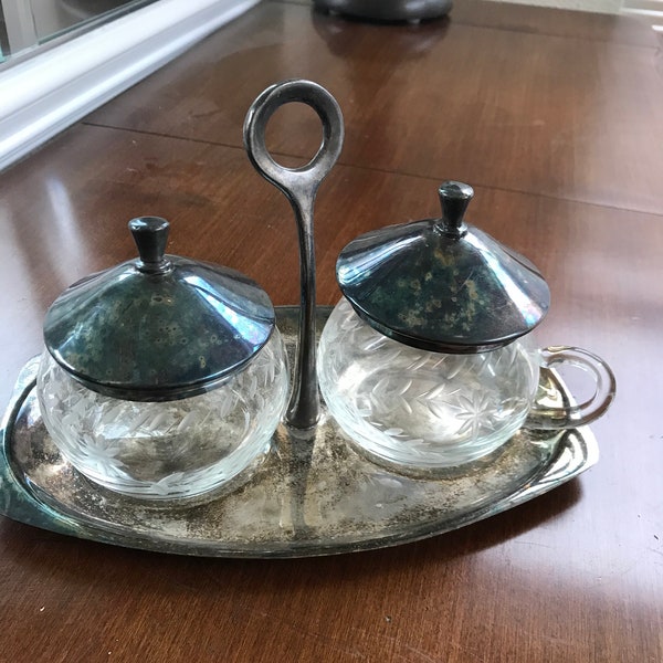 Made in Mexico silver plated cream and sugar set with a silver plated caddy 70’s cream and sugar set