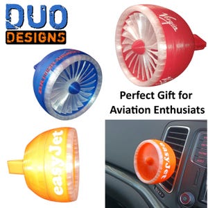 May include: Miniature jet engine-shaped air fresheners in blue, red, and orange, featuring the logos of British Airways, Virgin, and easyJet. The text "DUO DESIGNS" is visible. Ideal for car interiors.