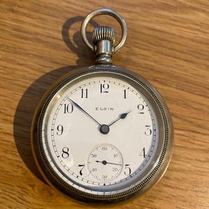Vintage antique  1900 SILVERODE Elgin , 7 Jewel open Face  Pocket Watch.