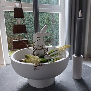 puristic, modern, round bowl with foot in Easter look - bunny, candlestick, eggs - nice Easter time -