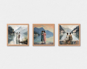 Puede incluir: Conjunto de tres impresiones artísticas enmarcadas. Cada impresión presenta un paisaje sereno con figuras. La obra de arte representa a personas con vestidos, de pie o sentadas cerca de un cuerpo de agua, con montañas al fondo. Los marcos son de color marrón claro.